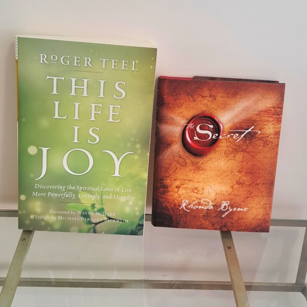 Bundle of manifestation books, " The secret " and " This life is joy."